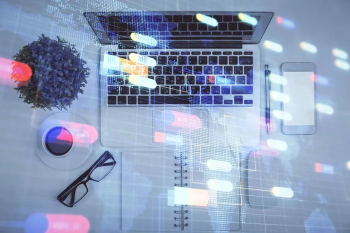 Business professional interviewing an IT consultant in a Kampala office