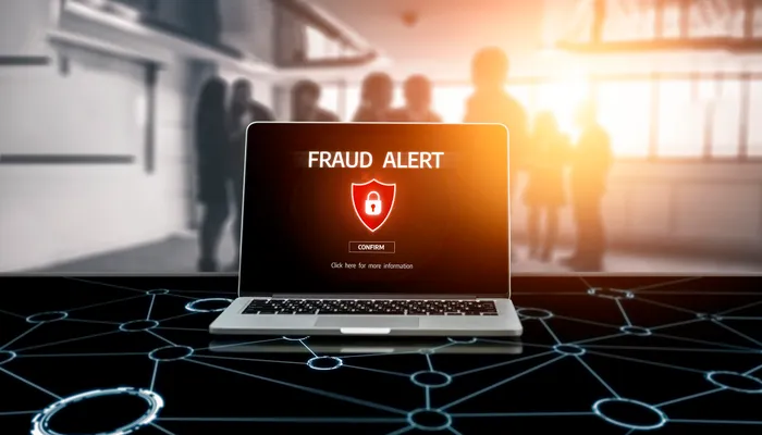 Hand presenting an access card to a reader, representing the first steps to contain compromised access after phishing