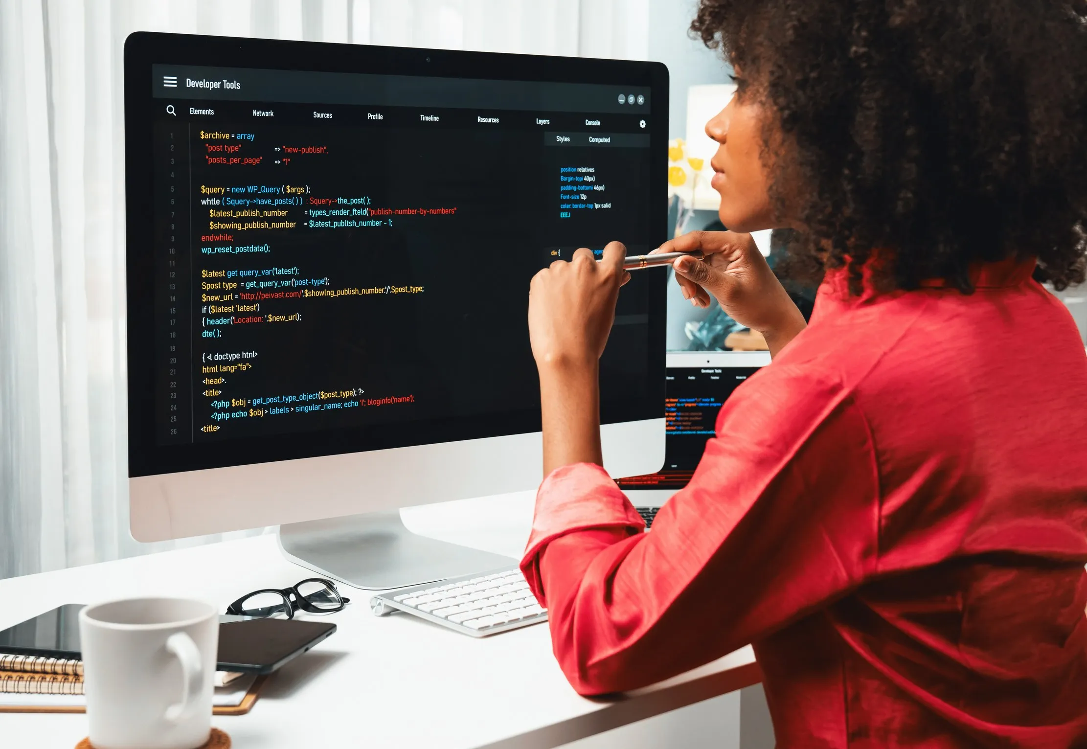Software delivery team reviewing project work on screen