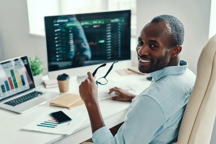 SME decision-maker working in an office, representing a deliberate, proportionate software buying decision