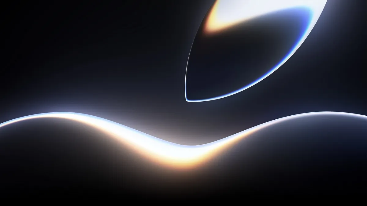 Developer working on Apple devices during WWDC 2026, representing the impact of Xcode 27, Siri AI, and Foundation Models