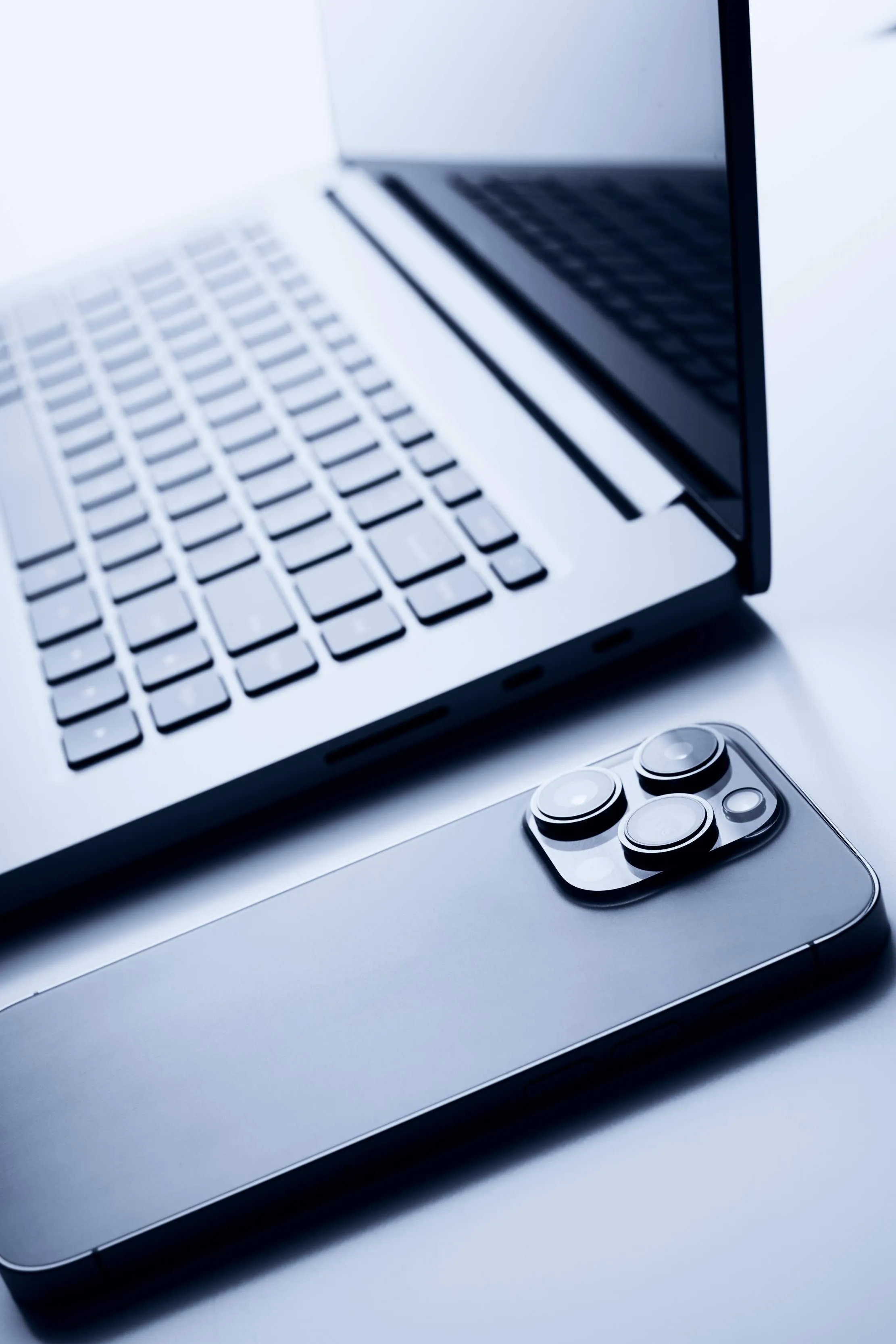 MacBook and iPhone in an Apple development workflow